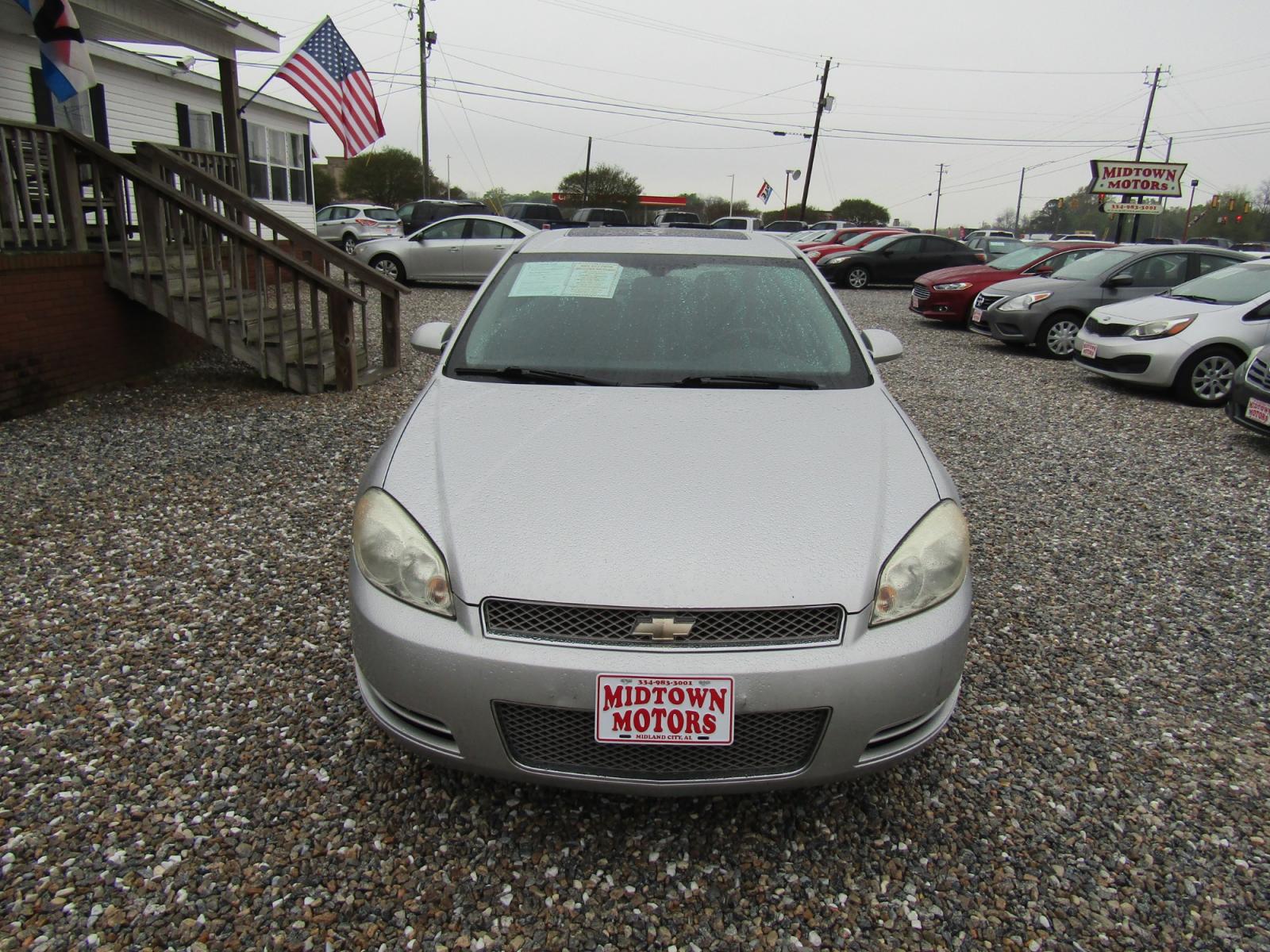 2014 Silver Chevrolet Impala LT (2G1WB5E30E1) with an 3.6L V6 DOHC 16V FFV engine, Automatic transmission, located at 15016 S Hwy 231, Midland City, AL, 36350, (334) 983-3001, 31.306210, -85.495277 - Photo #1